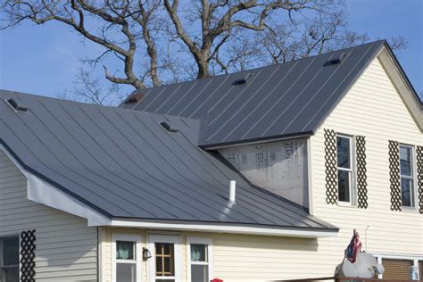 white house grey metal roof|white house charcoal trim.